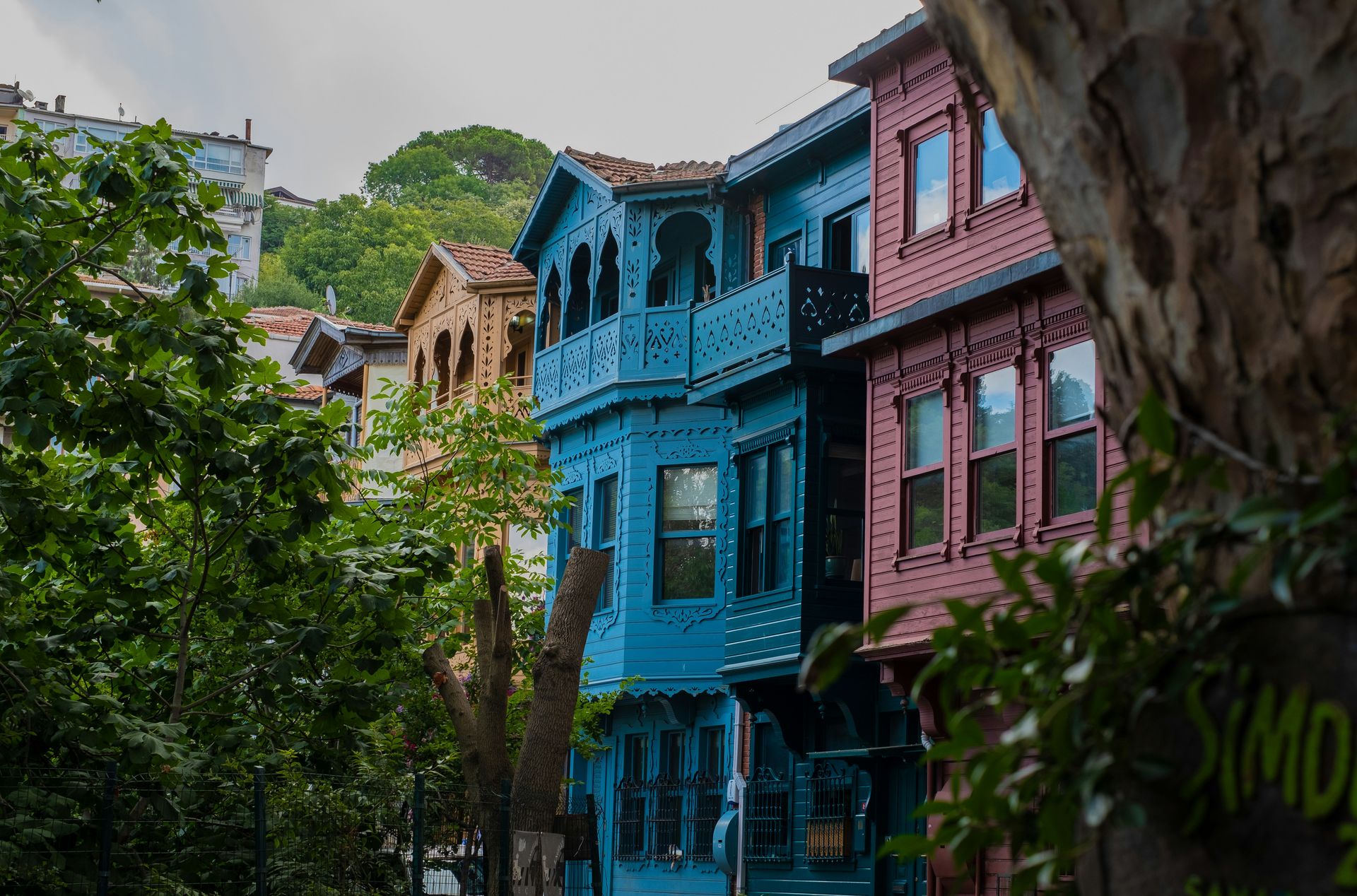 a blue building with a fence around it